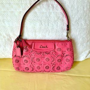 Coach leather perforated pink clutch